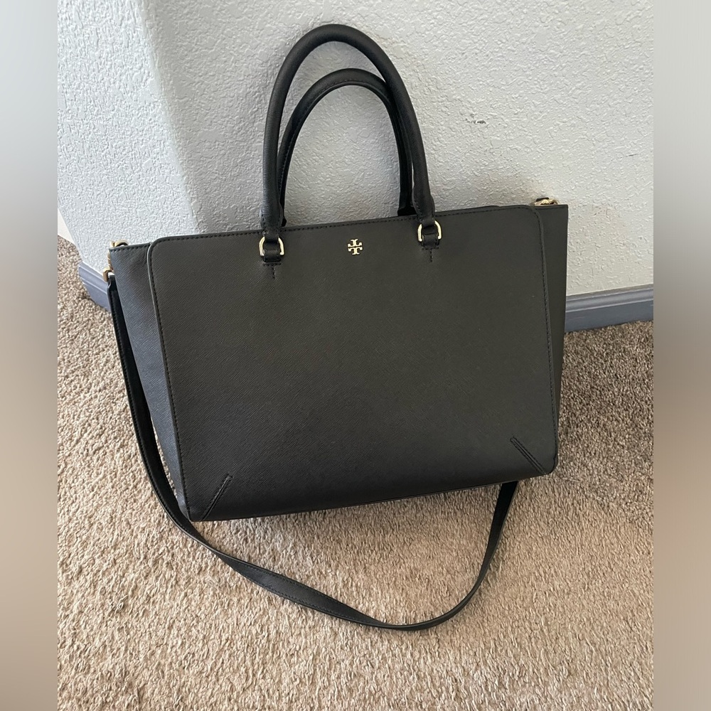 Black Tory Burch purse. Great condition. Minor wear and tear.